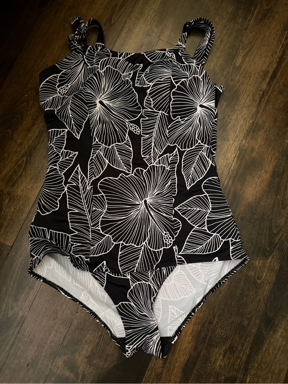 Black One-Piece Swimsuit with White Floral Outlines